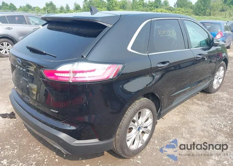 2022 Ford Edge Titanium z USA, uszkodzony, nr VIN 2FMPK4K90NBA39071